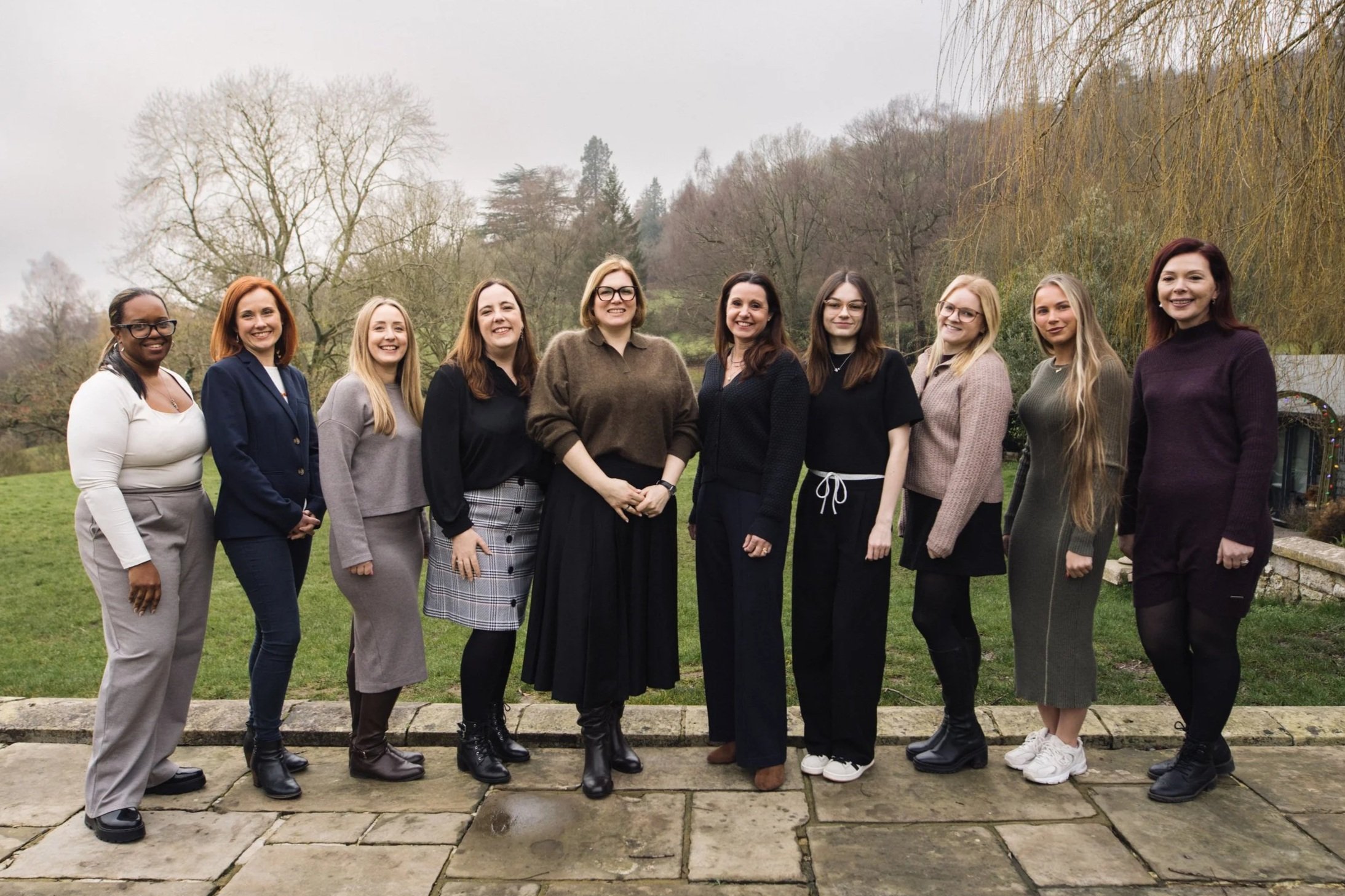 The Fractional HR Department team together outdoors